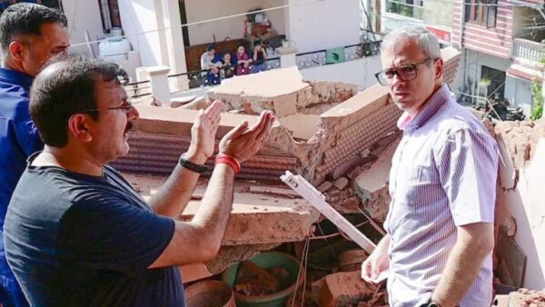 Jammu and Kashmir Chief Minister Omar Abdullah interacts with residents during his visit to the Rehari and Roopnagar areas to inspect the damage caused by recent shelling by Pakistan, in Jammu on Saturday. (ANI Photo)